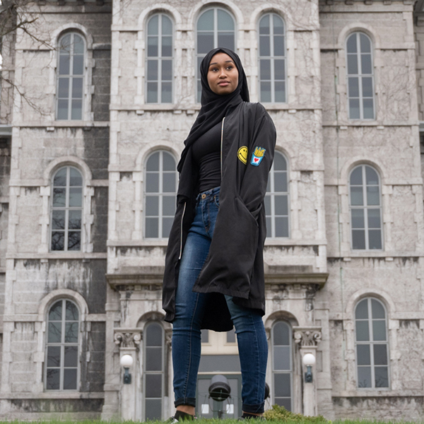 girl in front of hall of languages